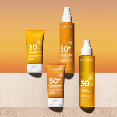 1 - Clarins Olio Solare Illuminante Protezione Alta SPF 30 150ml